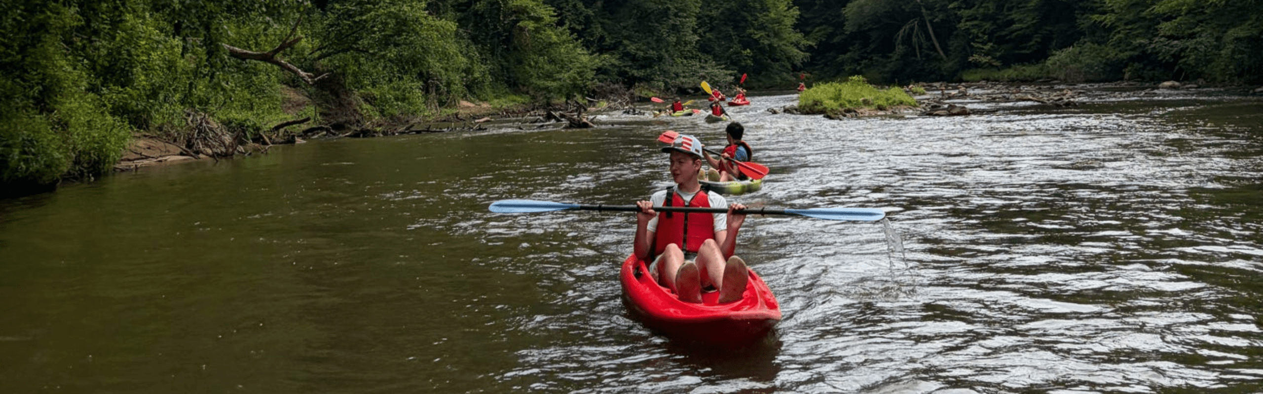 outdoor camp kayaking on river